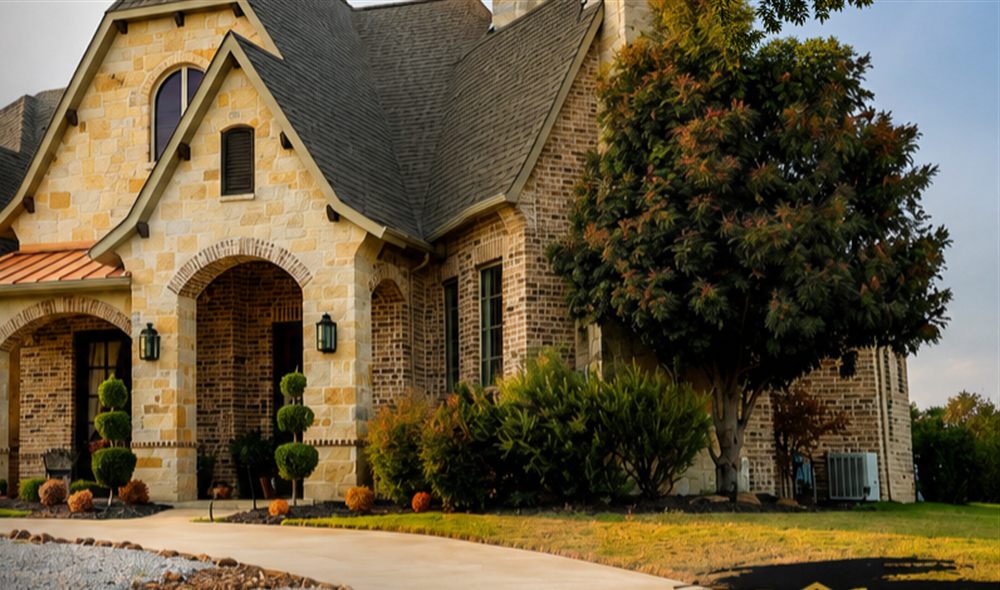 Stone and brick home with a new shingle roof